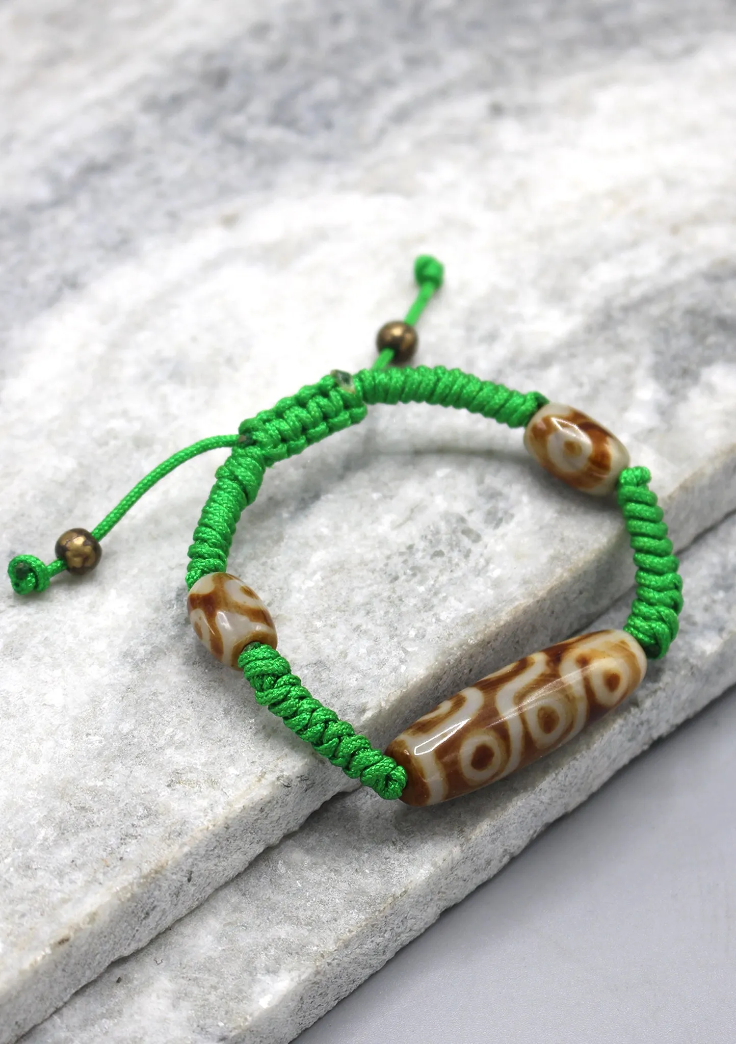 9 Eyes Dzi Bead on Lucky Knot Tibetan Bracelet