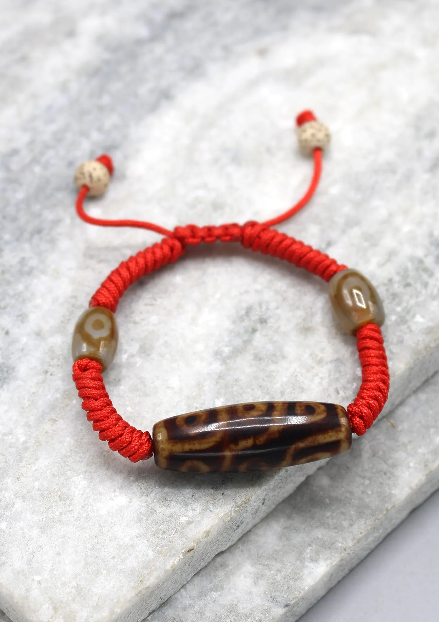 9 Eyes Dzi Bead on Lucky Knot Tibetan Bracelet