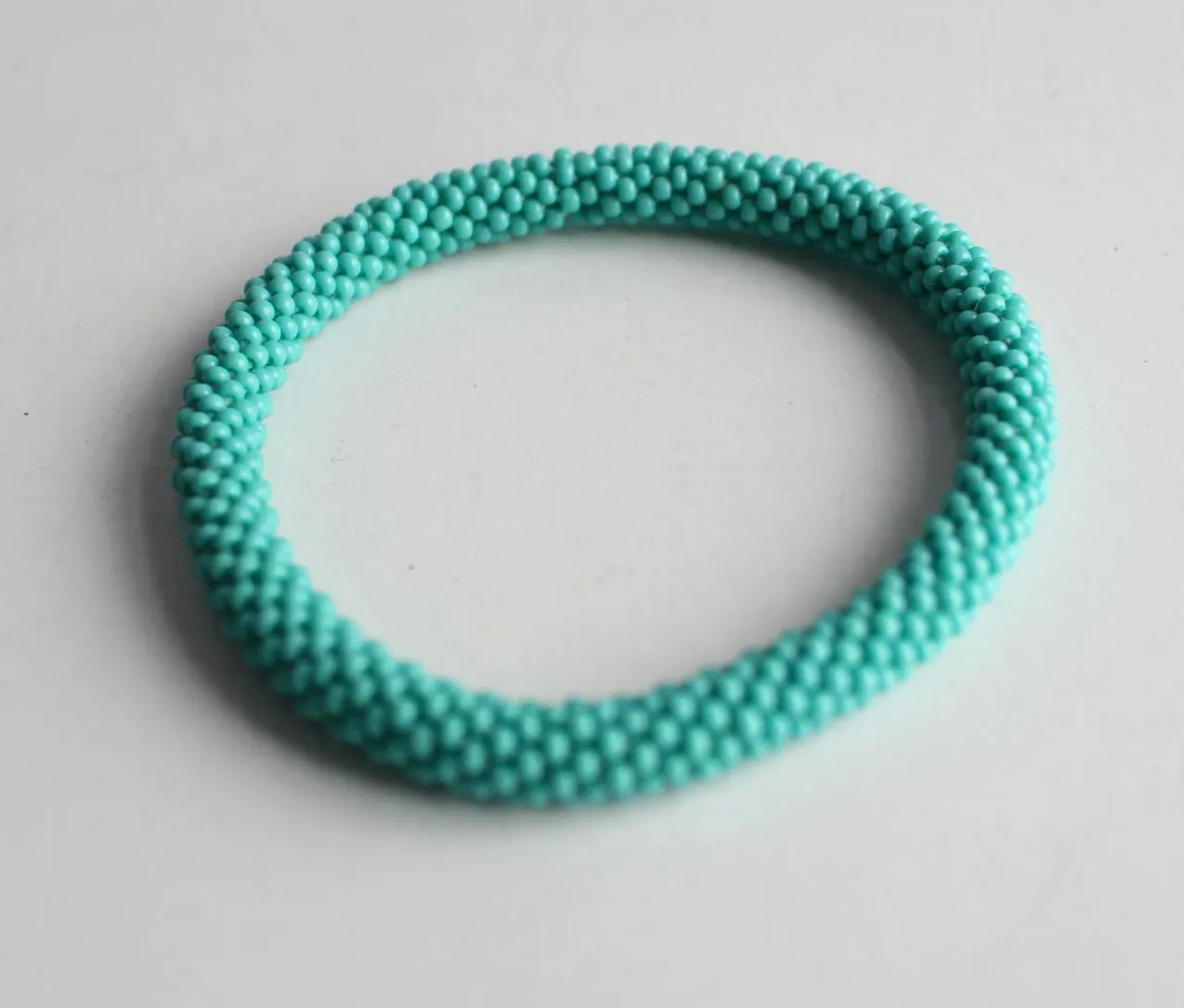 Plain Seafoam Green Glass Roll On Beads Bracelet