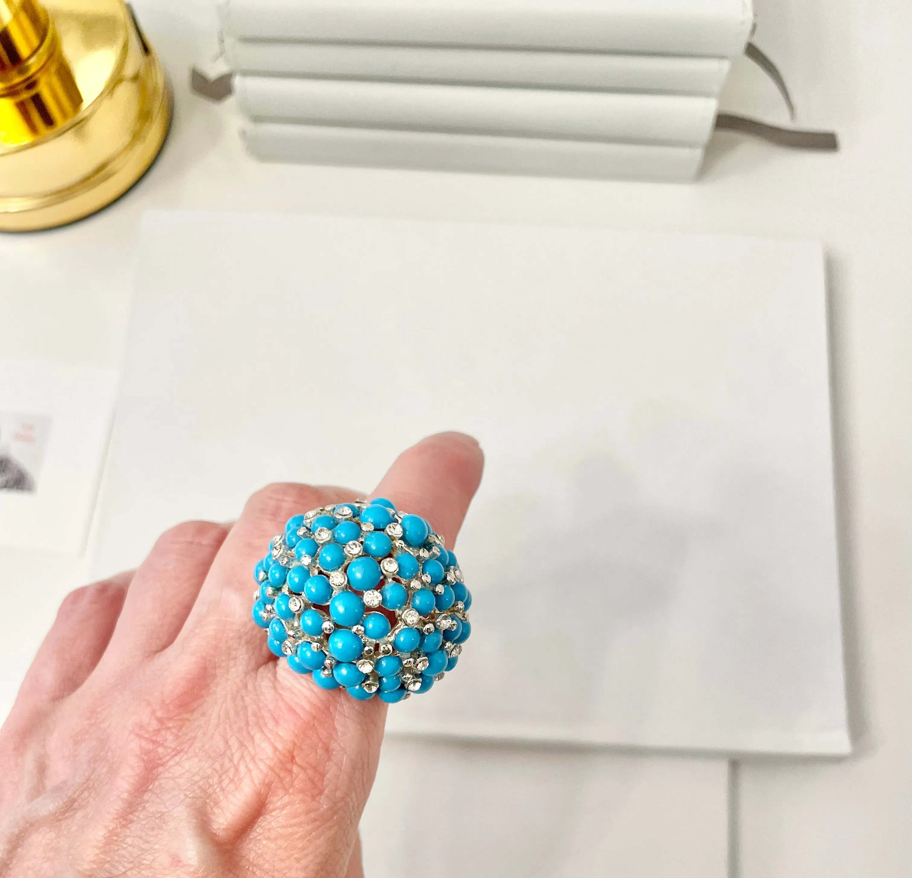 The Happy Hostess and her colorful life...this large faux turquoise cocktail ring is making all ladies gitty!