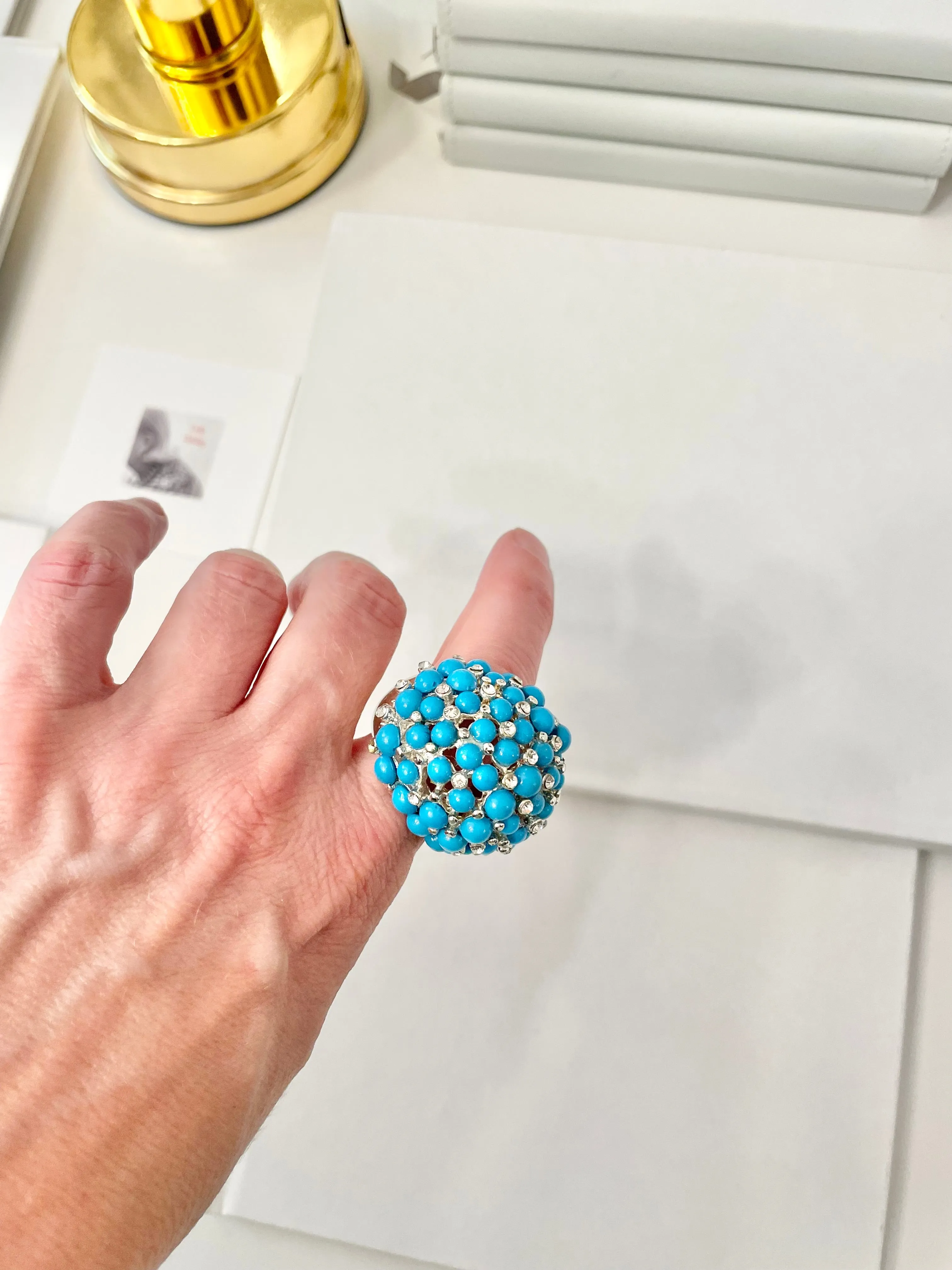 The Happy Hostess and her colorful life...this large faux turquoise cocktail ring is making all ladies gitty!