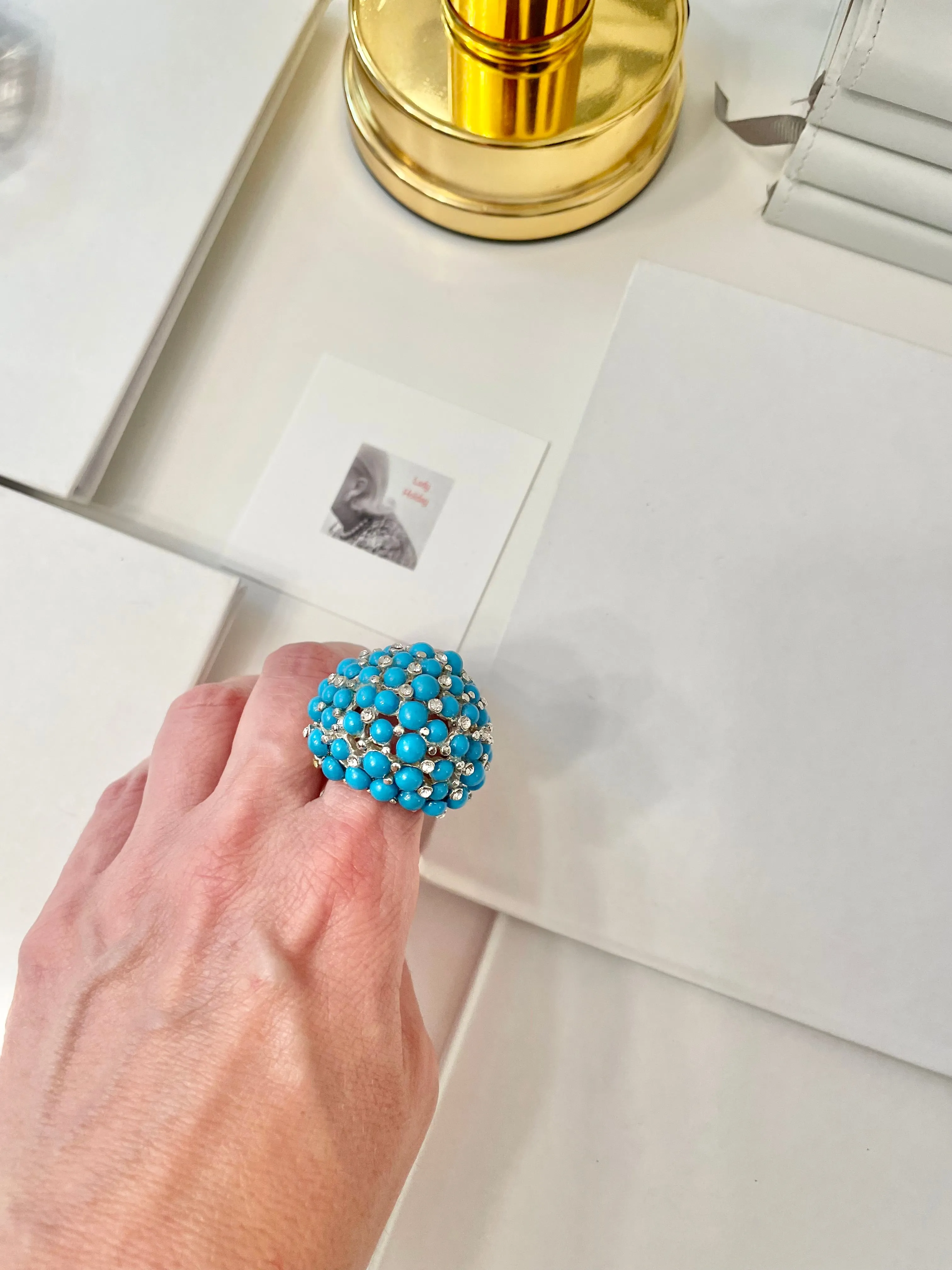 The Happy Hostess and her colorful life...this large faux turquoise cocktail ring is making all ladies gitty!