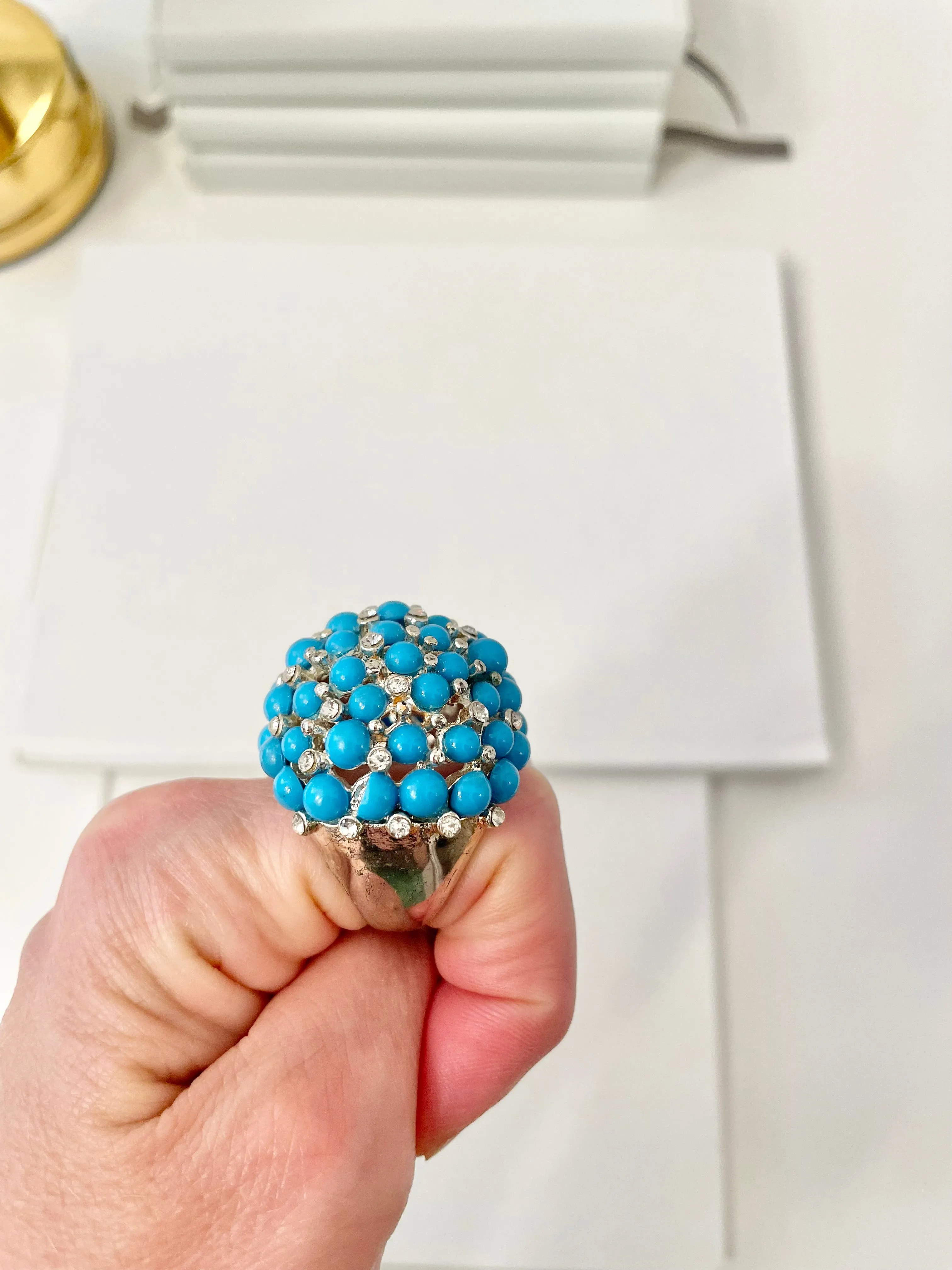 The Happy Hostess and her colorful life...this large faux turquoise cocktail ring is making all ladies gitty!