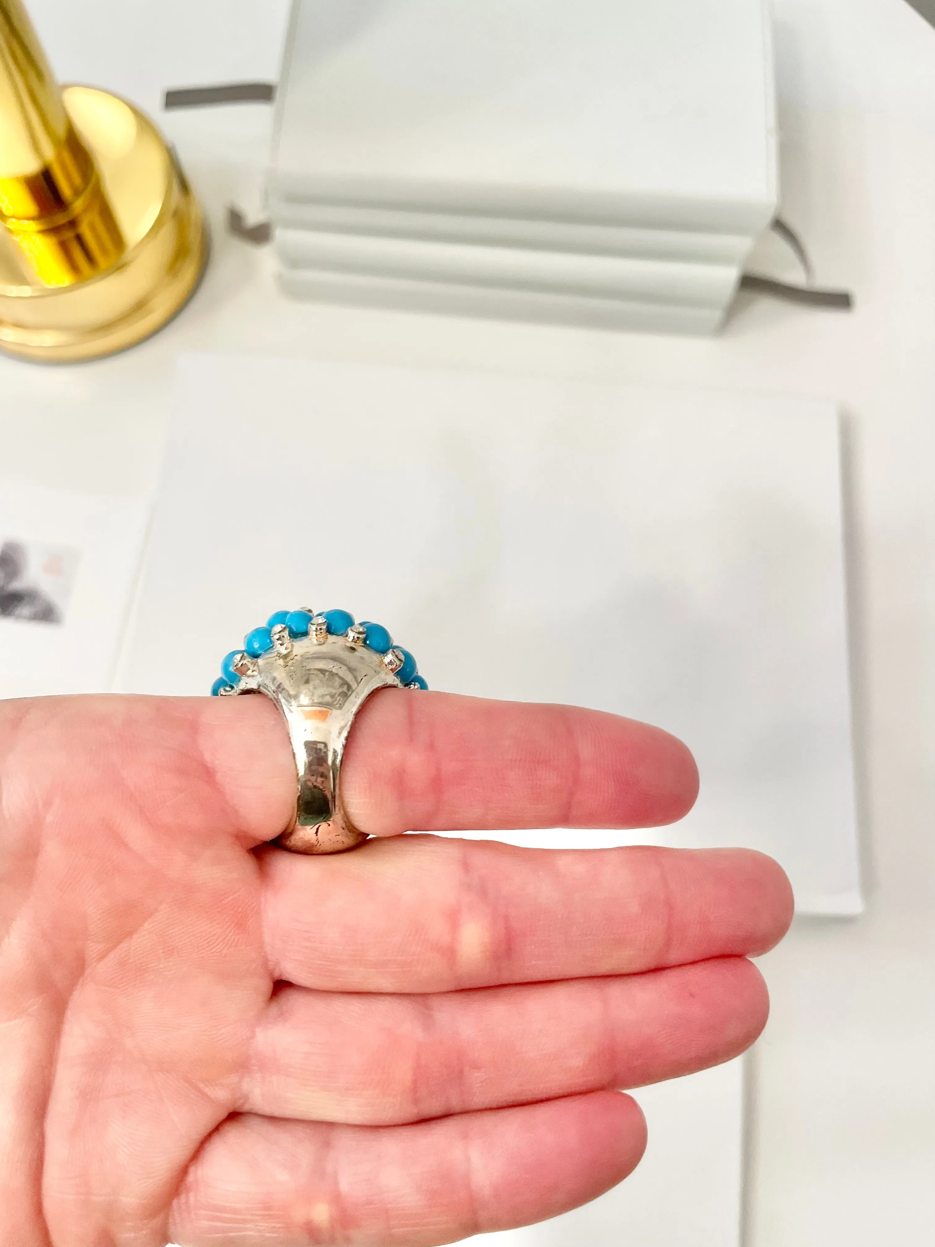 The Happy Hostess and her colorful life...this large faux turquoise cocktail ring is making all ladies gitty!